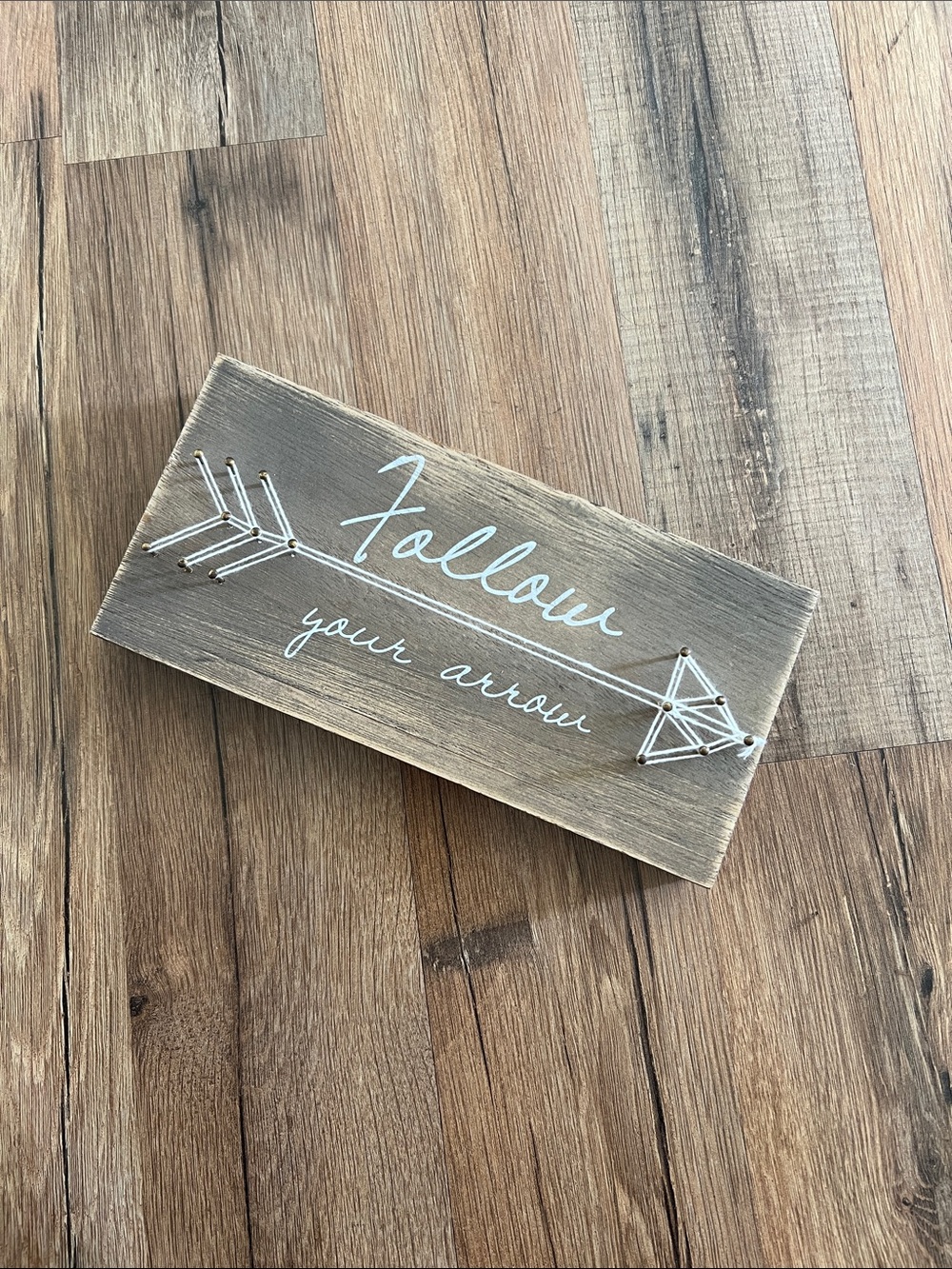 follow your arrow wall art